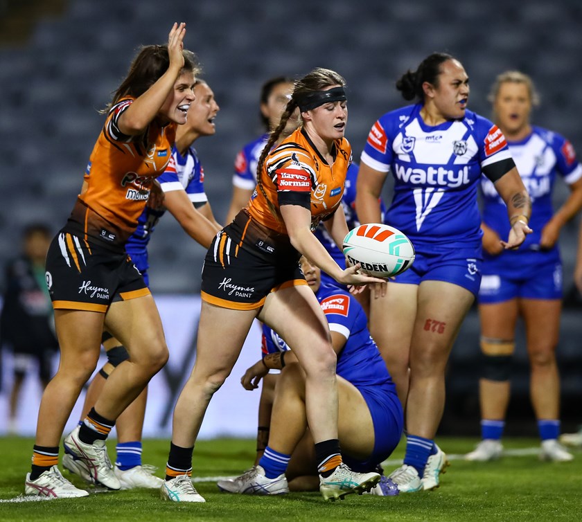Super sub...Faythe Manera celebrates her first of two tries in the win over the Bulldogs